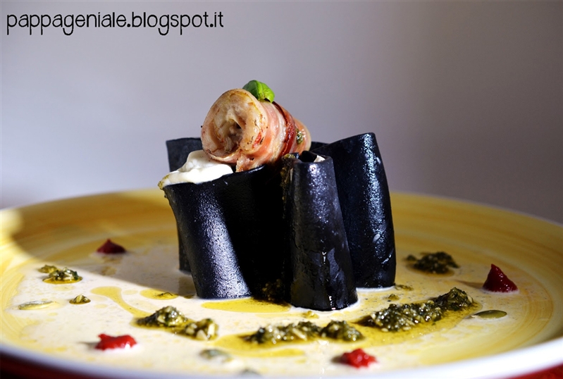 Paccheri with squid ink, buffalo mozzarella and mullet roulade and bacon