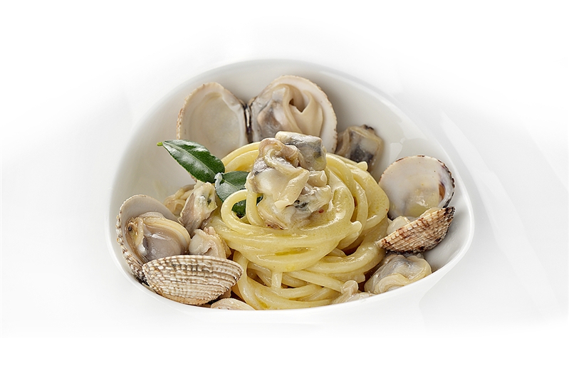 Fresh Leonessa Chittara Pasta, warty venus saltwater clams, bergamot orange from the Calabria region and aged Parmigiano-Reggiano cheese